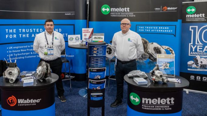 Mike and Jose stand on the Melet HDAW exhibition stand